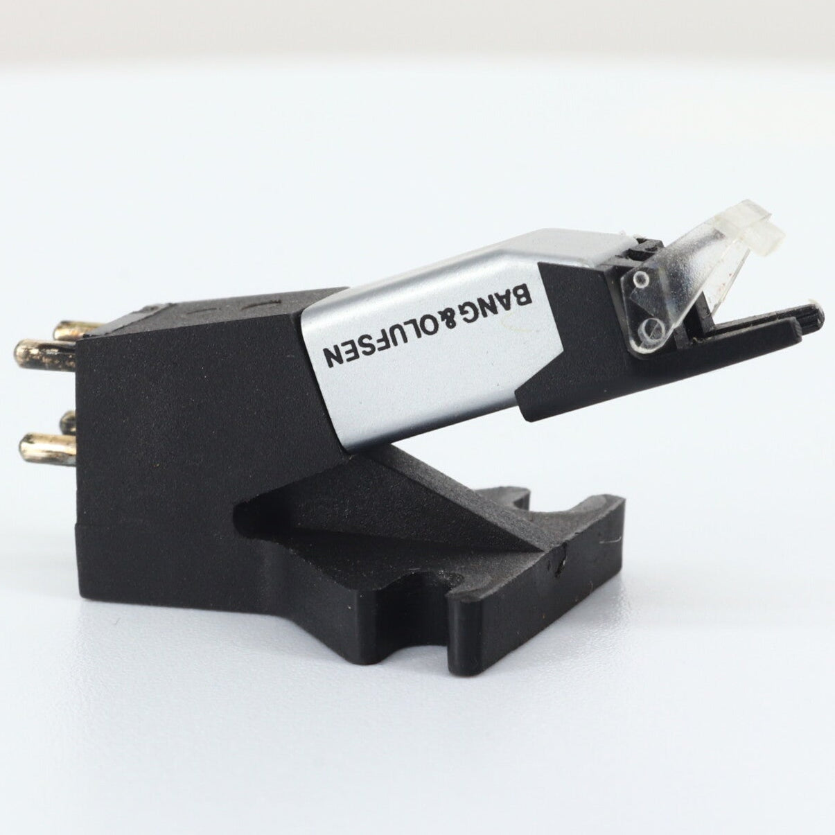Audio cartridge with 'B&O' branding on a white background