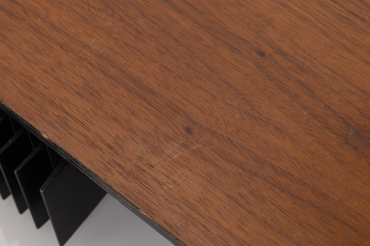 Close up of a used A&R A60 Integrated Amplifier in a Teak finish showing scratches on top