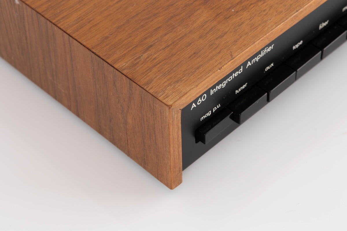 Front left corner of a used A&R A60 Integrated Amplifier in a Teak finish