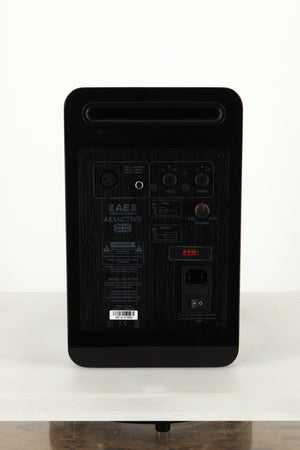 Rear view of a used Acoustic Energy AE1 Active Standmount Speakers in Black Piano Lacquer finish