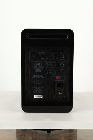 Rear view of a used Acoustic Energy AE1 Active Standmount Speakers in Black Piano Lacquer finish