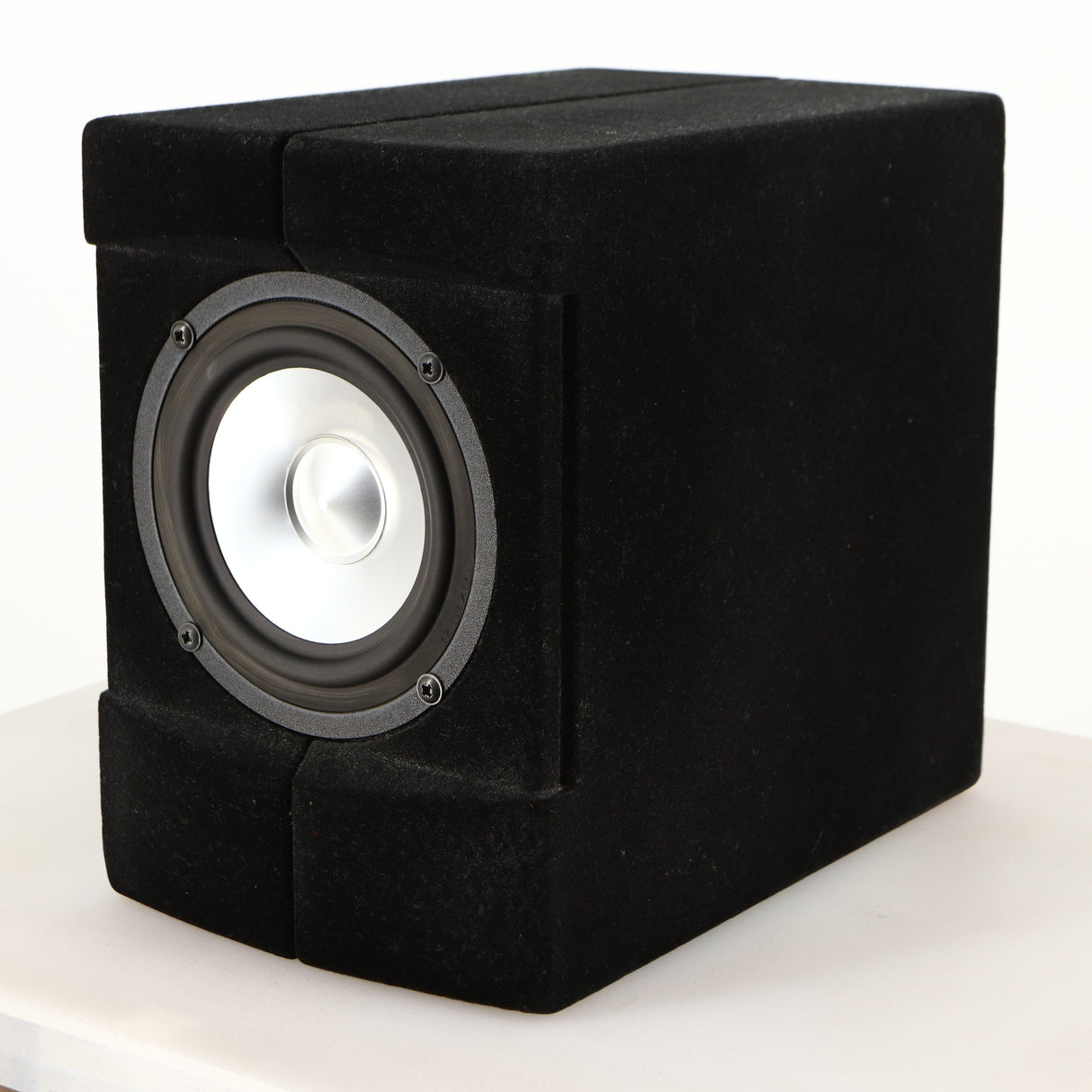 Front right corner of a used Acoustic Precision Eikos FR1 Standmount Speaker in a black flock finish