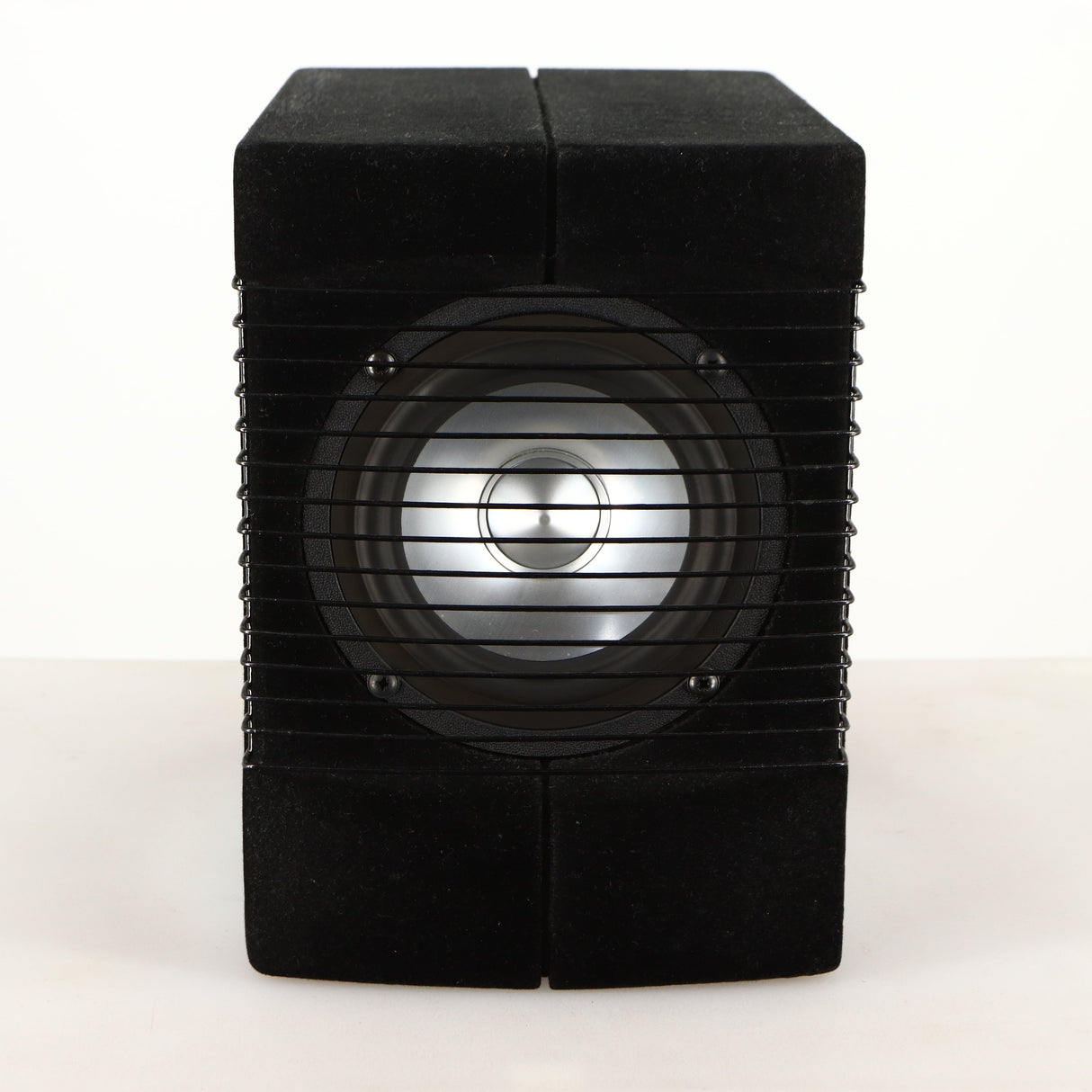 Front view of a used Acoustic Precision Eikos FR1 Standmount Speaker in a black flock finish showing grille