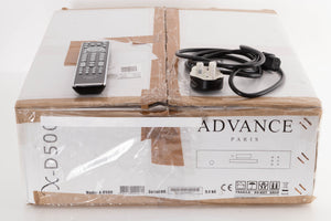 Box of a used Advance Paris X-D500 CD Transport with mains cable, manual, and remote