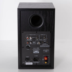 Rear view of a used Advanced Paris AIR 65 Wireless Speaker - Bluetooth Only in a Black finish showing Mains Input, Phono Inputs and Phono Outputs