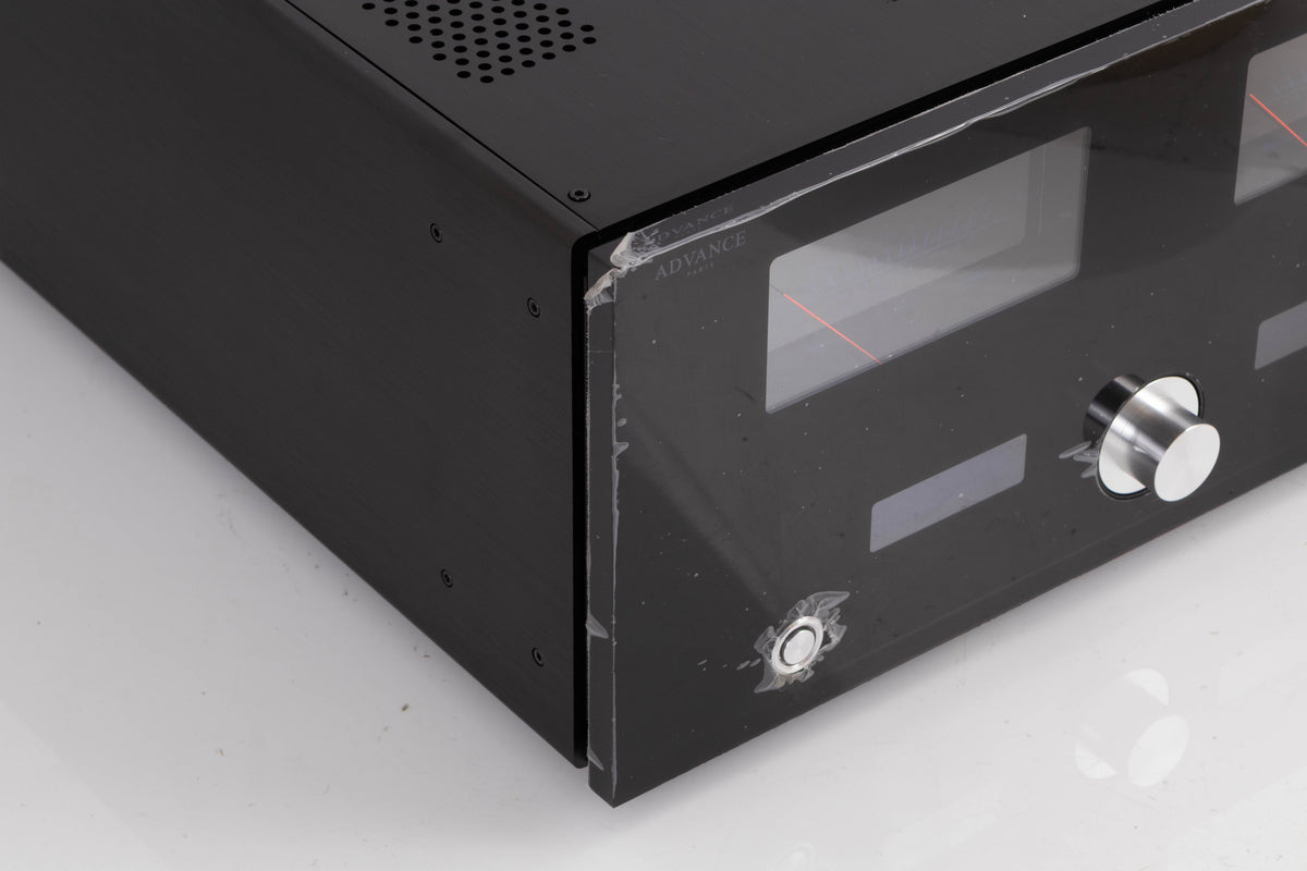 Front left corner of a used Advanced Paris X-i1100 Integrated Amplifier in a Black finish