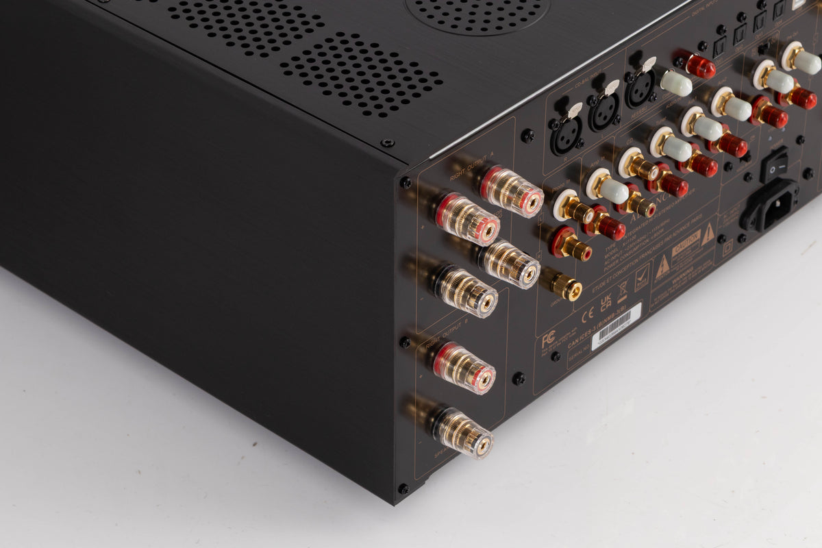 Rear right corner of a used Advanced Paris X-i1100 Integrated Amplifier in a Black finish