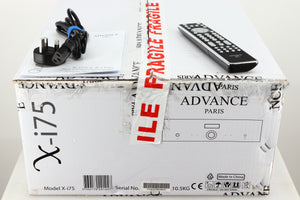 Box for a used Advanced Paris X-i75 Integrated Amplifier in a black finish showing Remote, 2x Batteries, Manual and Mains Cable