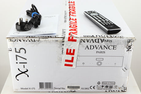 Box for a used Advanced Paris X-i75 Integrated Amplifier in a black finish showing Remote, 2x Batteries, Manual and Mains Cable