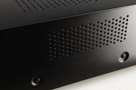 Close up of a used Advanced Paris X-i75 Integrated Amplifier in a black finish showing scratch on right side