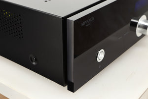 Front left corner of a used Advanced Paris X-i75 Integrated Amplifier in a black finish