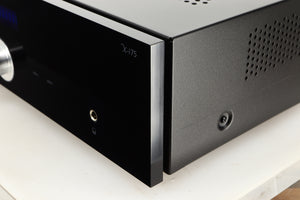 Front right corner of a used Advanced Paris X-i75 Integrated Amplifier in a black finish