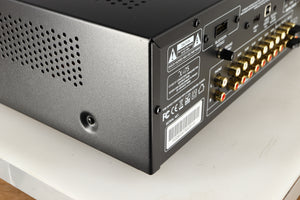 Rear right corner of a used Advanced Paris X-i75 Integrated Amplifier in a black finish