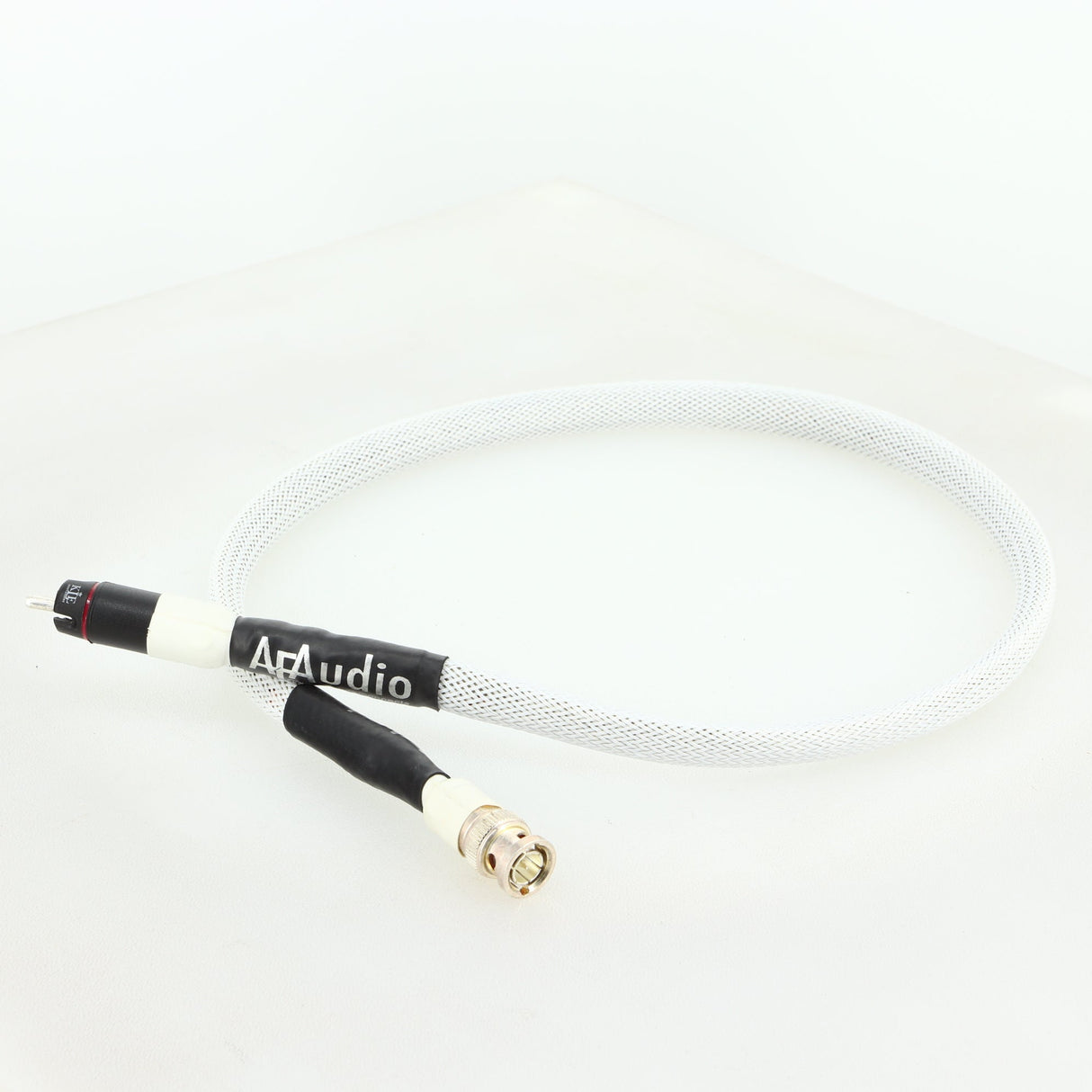 Front right corner of a used AF Audio Silver Digital Interconnect Cable RCA-BNC 0.75m in a white finish