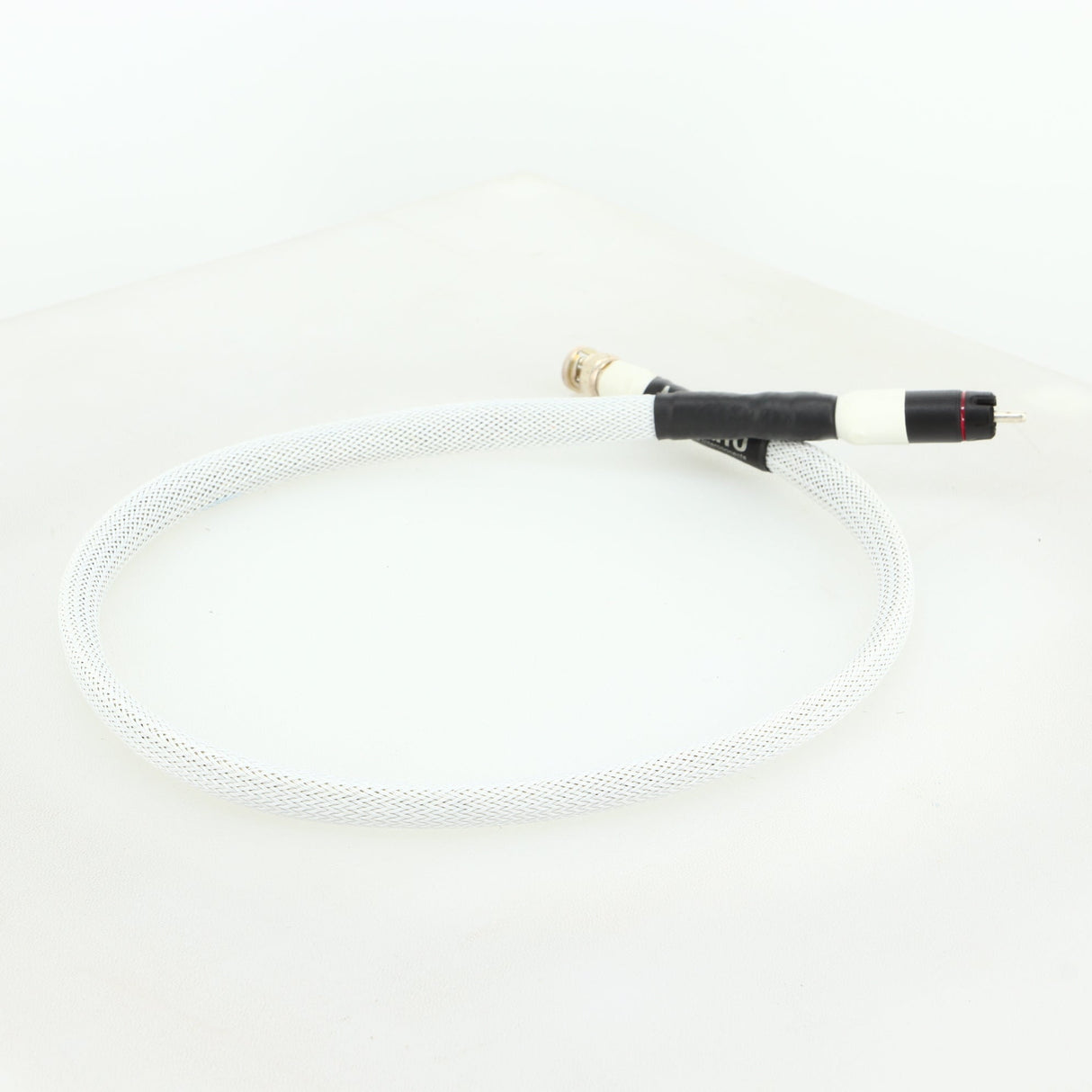 Rear left corner of a used AF Audio Silver Digital Interconnect Cable RCA-BNC 0.75m in a white finish