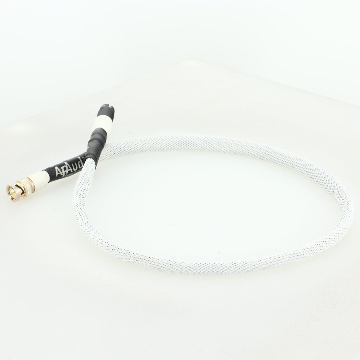 Rear right corner of a used AF Audio Silver Digital Interconnect Cable RCA-BNC 0.75m in a white finish