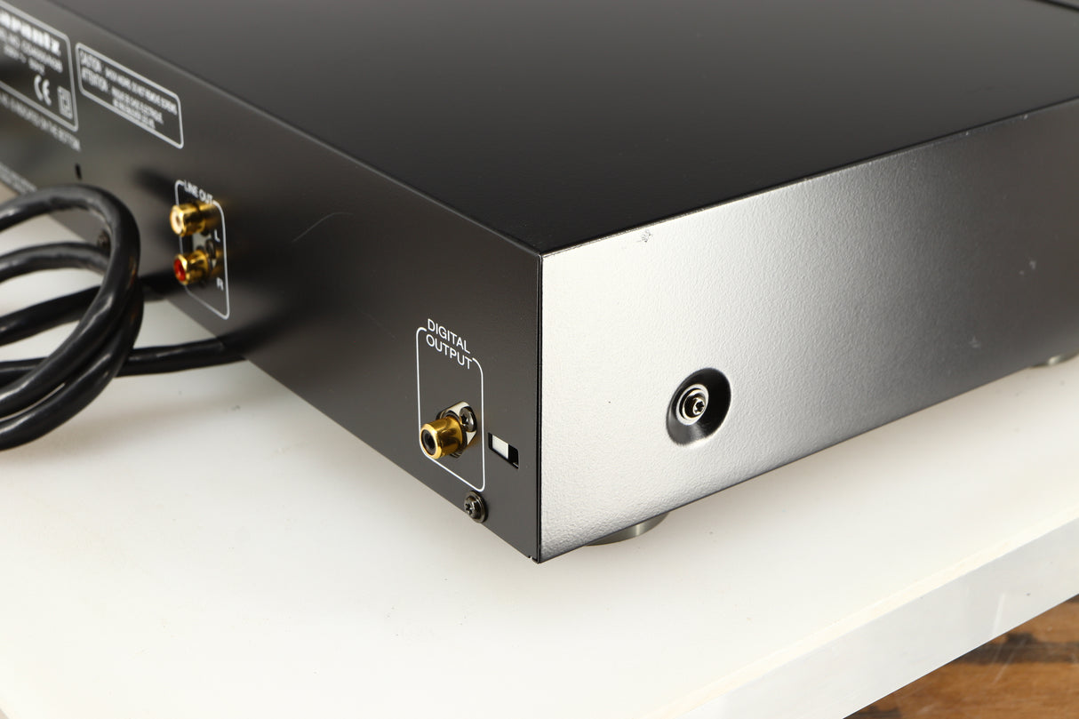 Rear left corner of a used AH! Njoe Tjoeb 4000 CD Player in a black finish