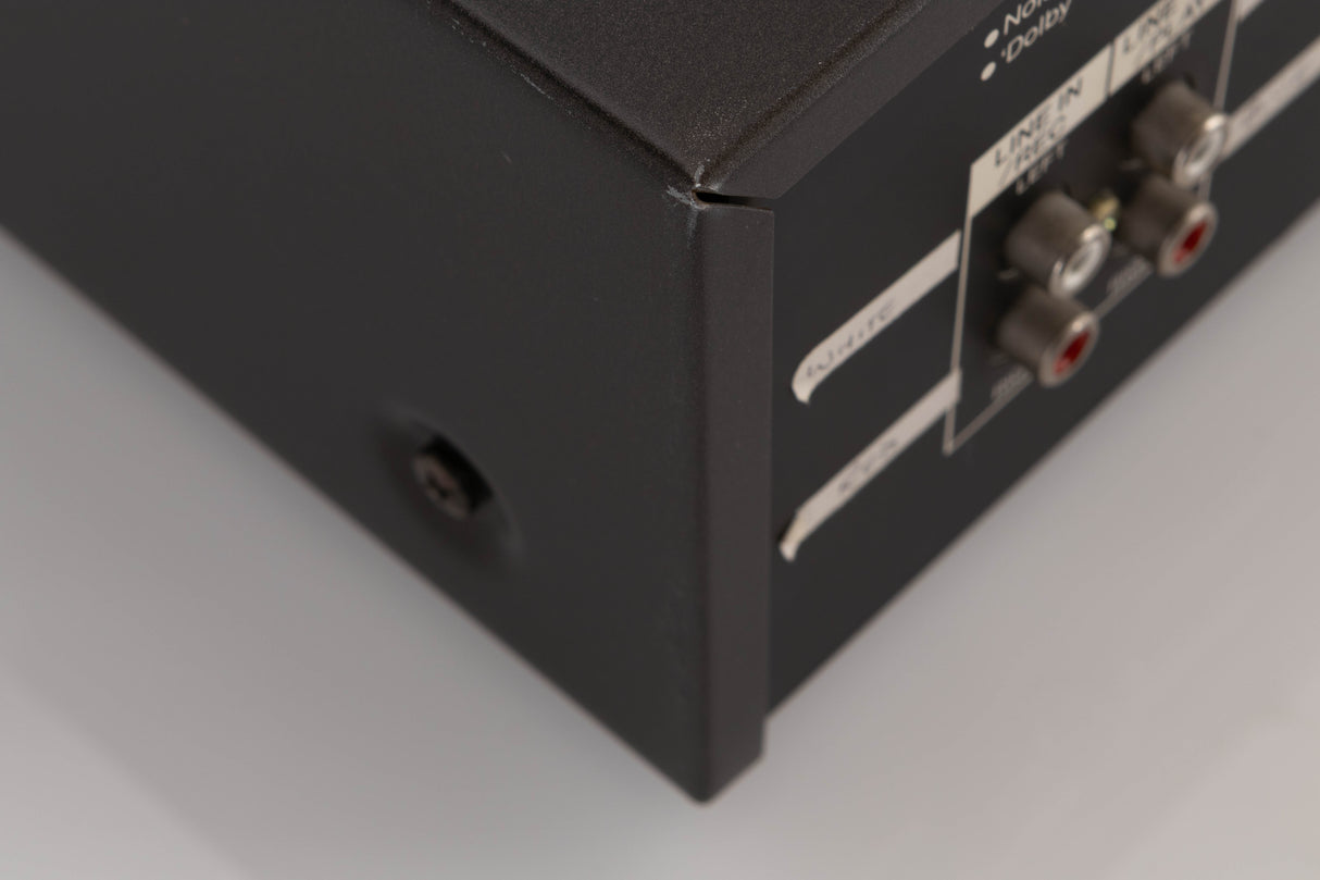 Close up of a used Aiwa F250 Cassette Deck showing scratches on unit