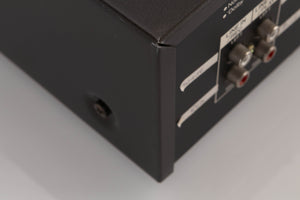 Close up of a used Aiwa F250 Cassette Deck showing scratches on unit