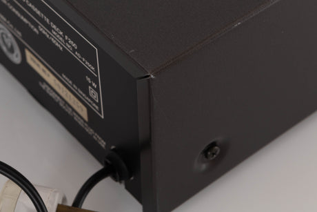Close up of a used Aiwa F250 Cassette Deck showing scratches on unit