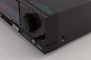 Front right corner of a used Aiwa F250 Cassette Deck