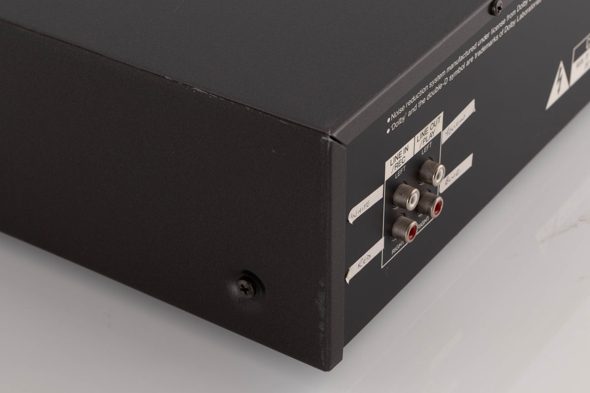Rear right corner of a used Aiwa F250 Cassette Deck