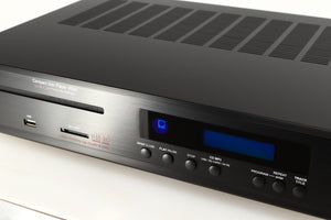 Close up of a used AMC XCDise-vt CD Player With MD5404us2 Tube Output in a black finish showing some of the fascia