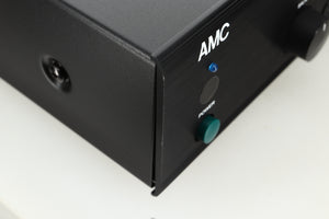 Close up view of an Ex Demo AMC XIA50 Integrated Amplifier front left corner showing some scratches