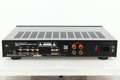 Rear view of an Ex Demo AMC XIA50 Integrated Amplifier showing RCA and mains inputs, and speaker outputs