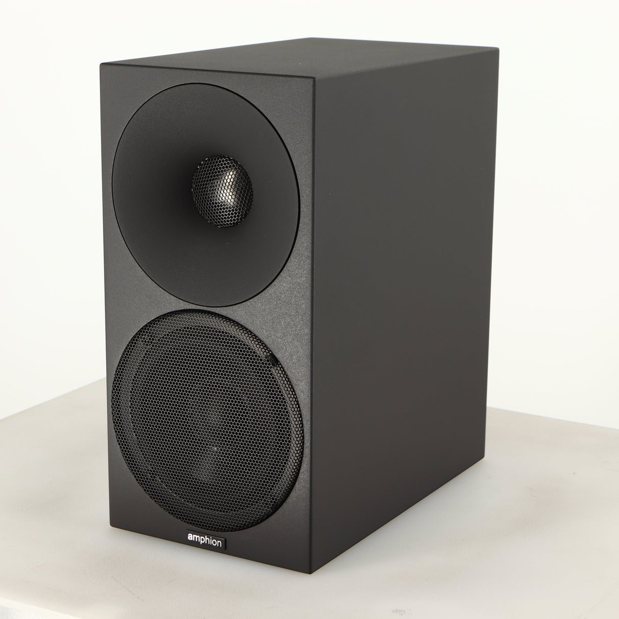 Front right corner of a used Amphion Helium 410 Standmount Speaker in a black finish