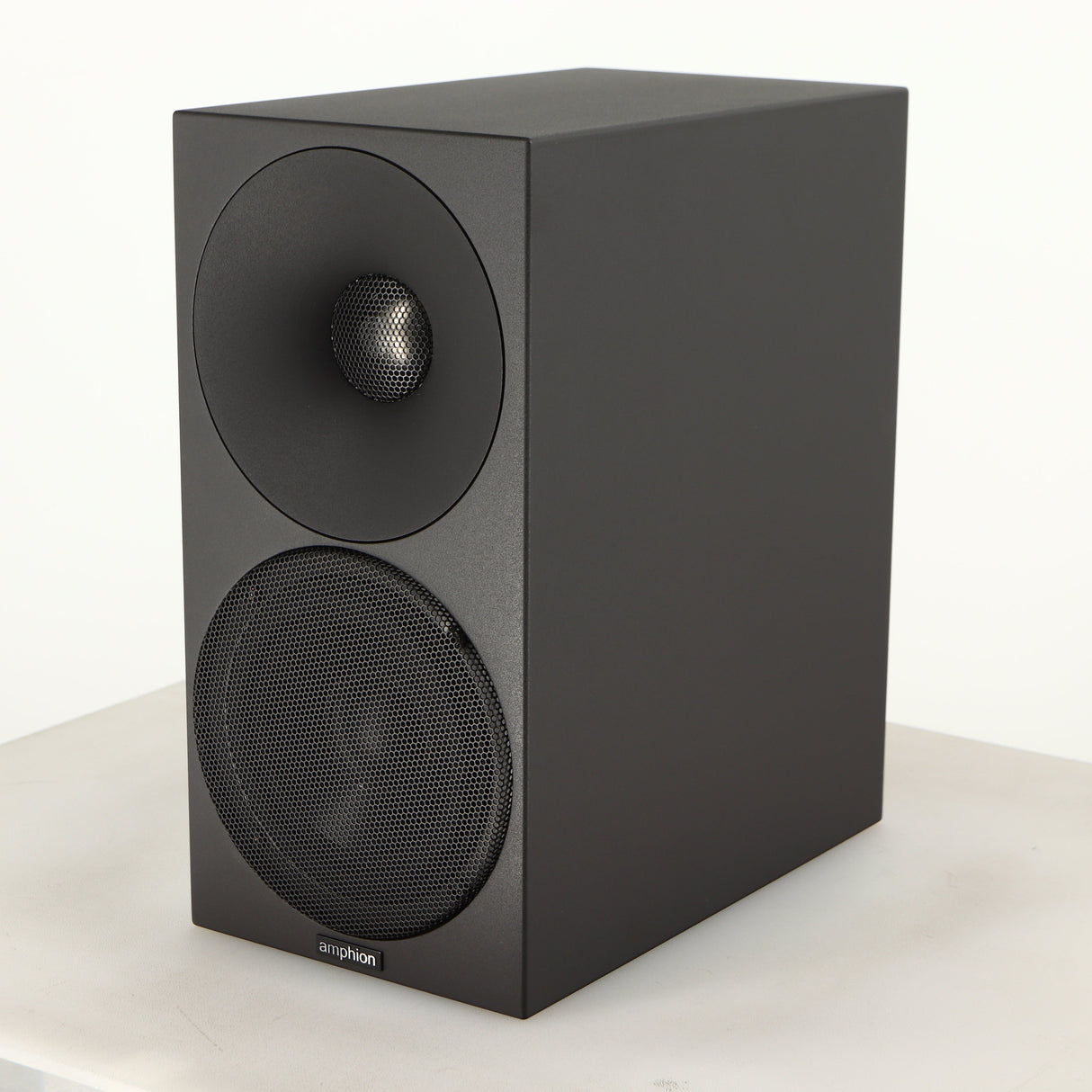 Front right corner of a used Amphion Helium 410 Standmount Speaker in a black finish