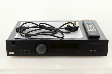 View of a used Arcam A19 Integrated Amplifier showing mains cable, and system remote 