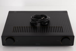 Top of a used Arcam A5 Integrated Amplifier in a Black finish showing Mains Cable