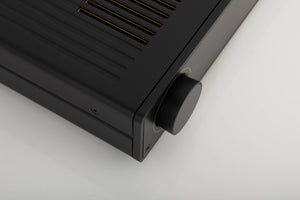 Front left corner of a used Arcam A5 Integrated Amplifier in a black finish
