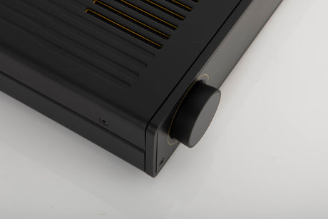 Front left corner of a used Arcam A5 Integrated Amplifier in a black finish