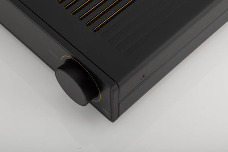 Front right corner of a used Arcam A5 Integrated Amplifier in a black finish