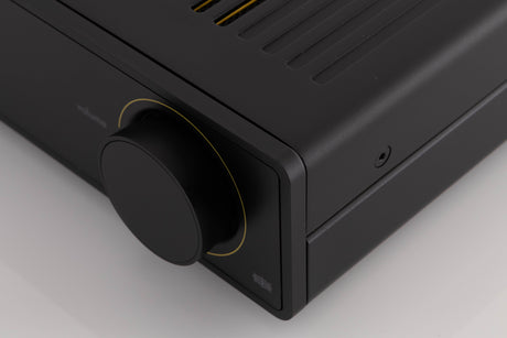 Front right corner of a used Arcam A5 Integrated Amplifier in a Black finish