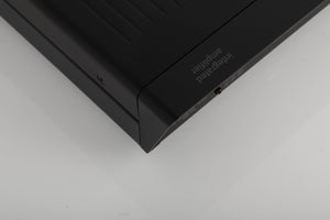 Rear right corner of a used Arcam A5 Integrated Amplifier in a black finish