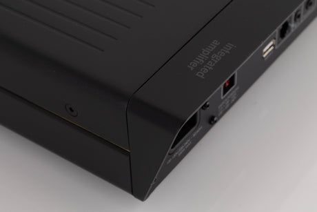 Rear right corner of a used Arcam A5 Integrated Amplifier in a Black finish