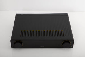 Top of a used Arcam A5 Integrated Amplifier in a black finish