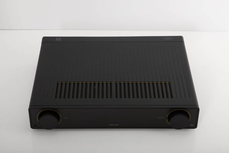 Top of a used Arcam A5 Integrated Amplifier in a black finish