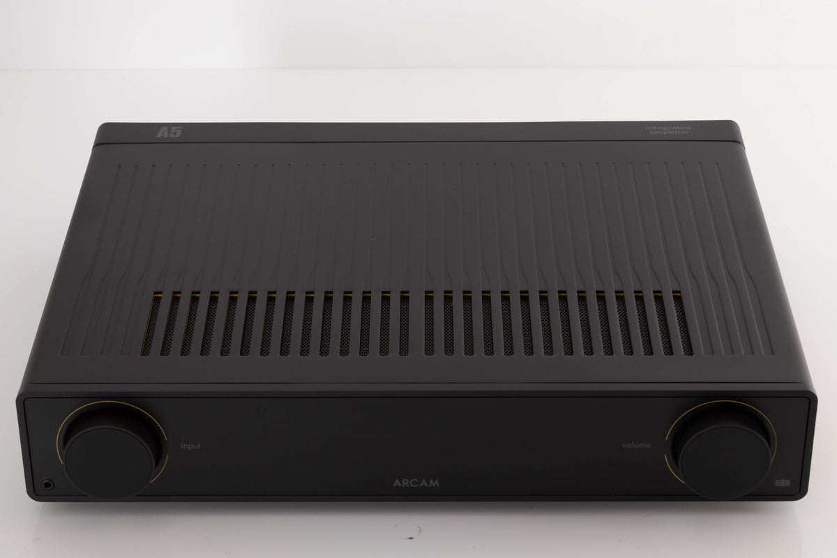Top of a used Arcam A5 Integrated Amplifier in a Black finish