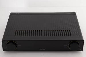 Top of a used Arcam A5 Integrated Amplifier in a Black finish