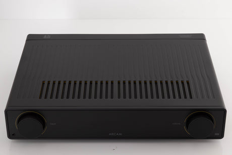 Top of a used Arcam A5 Integrated Amplifier in a Black finish