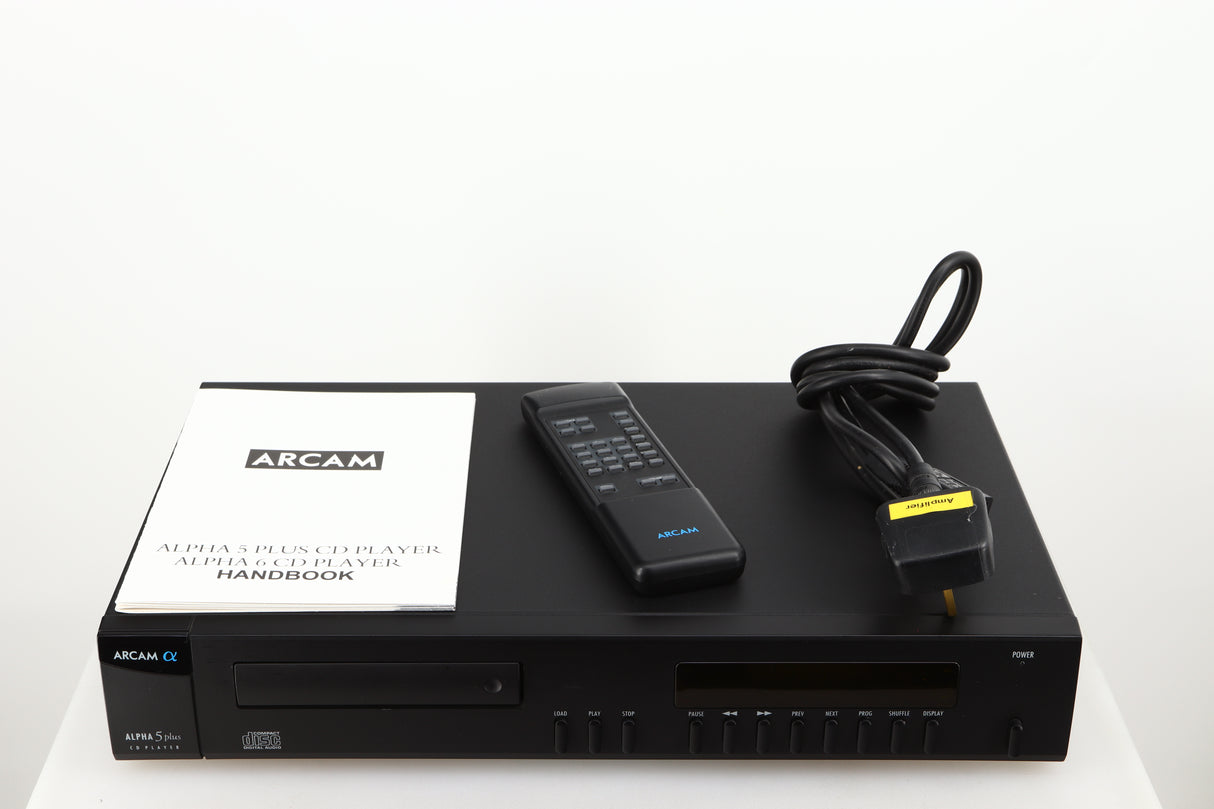 Top of a used Arcam Alpha 5 Plus CD Player in a black finish showing Manual, Remote and Mains Cable