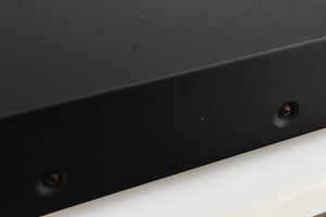 Close up of a used Arcam Alpha 5 Plus CD Player in a black finish showing tiny dink in cabinet on left side 