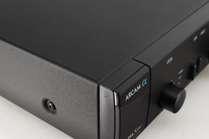 Close up of a used Arcam Alpha 5 Plus Integrated Amplifier in a black finish showing scratch on front left corner