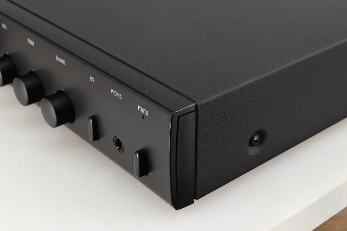 Front right corner of a used Arcam Alpha 5 Plus Integrated Amplifier in a black finish