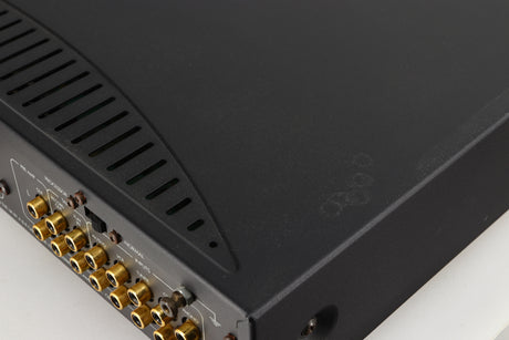 Close up of a used Arcam Alpha 8R Integrated Amplifier in a black finish showing marks on top