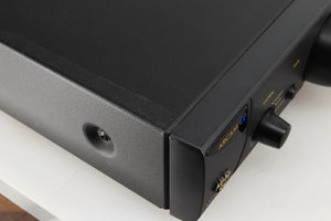 Close up of a used Arcam Alpha 8R Integrated Amplifier in a black finish showing scratch on top